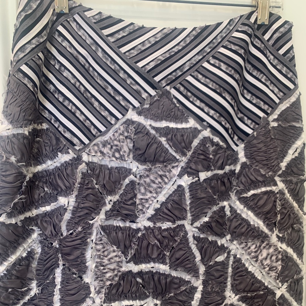 Very cute knee length pencil skirt with pieced fabric
